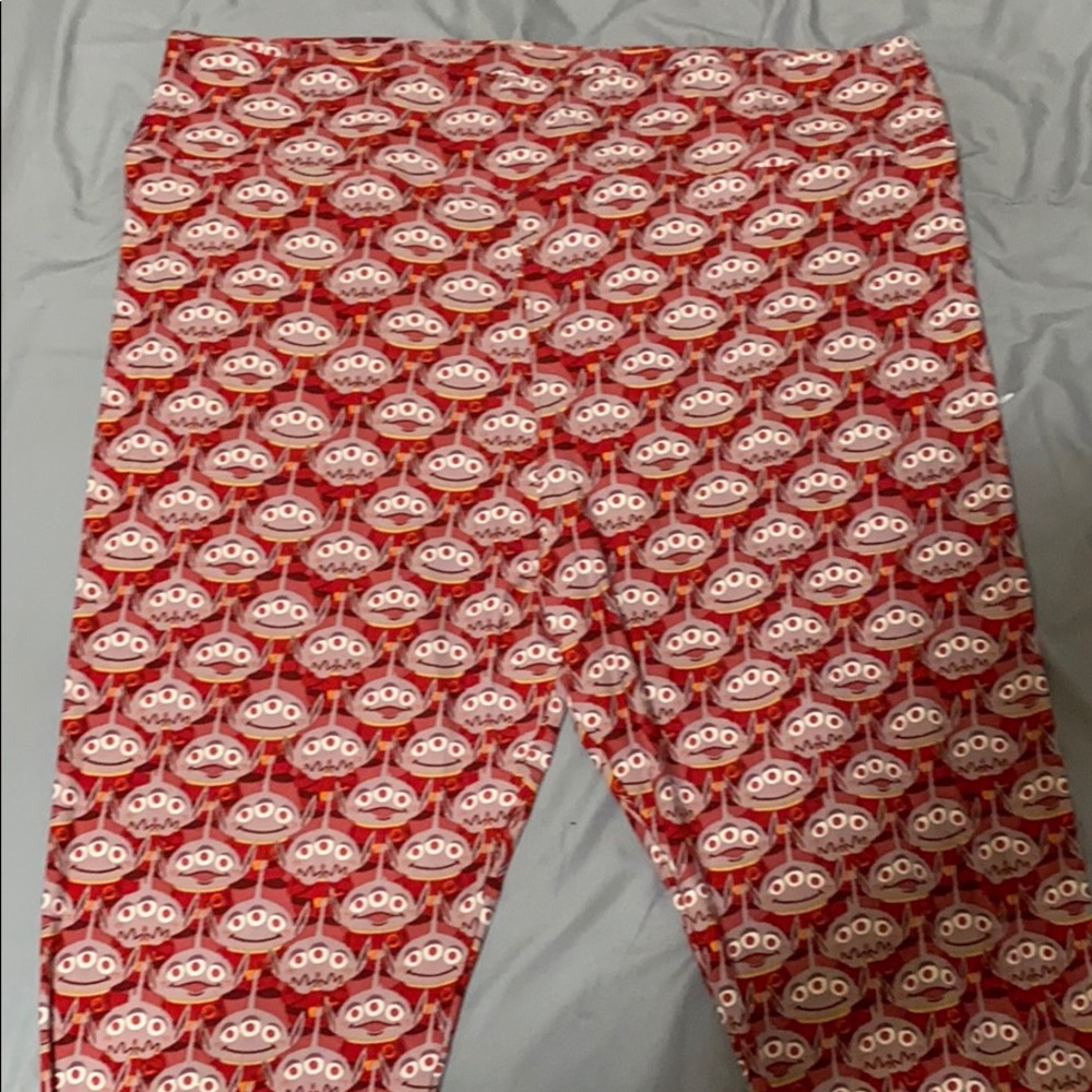 Red leggings with toy story aliens